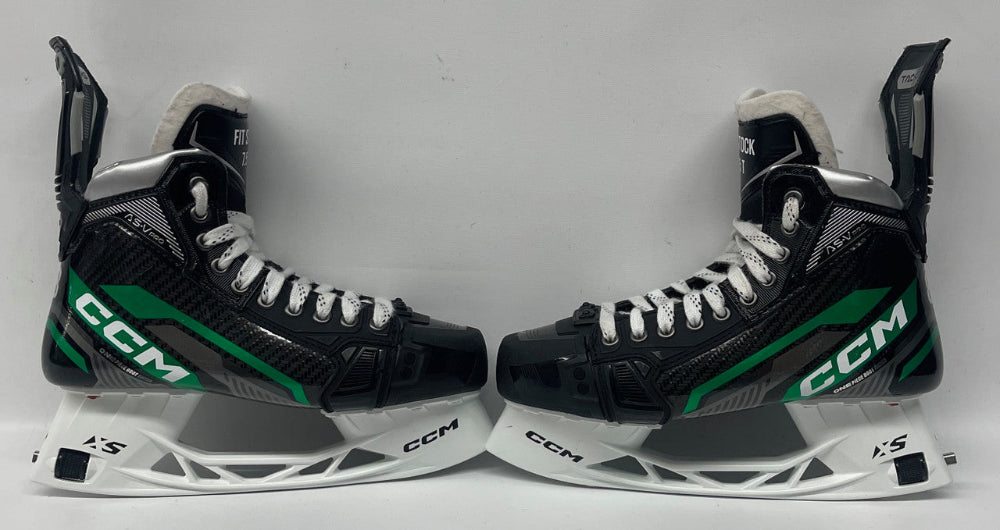 black skates with green detail