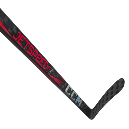 black hockey stick with red writing and details
