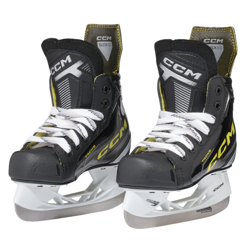 Two black skates, with yellow CCM