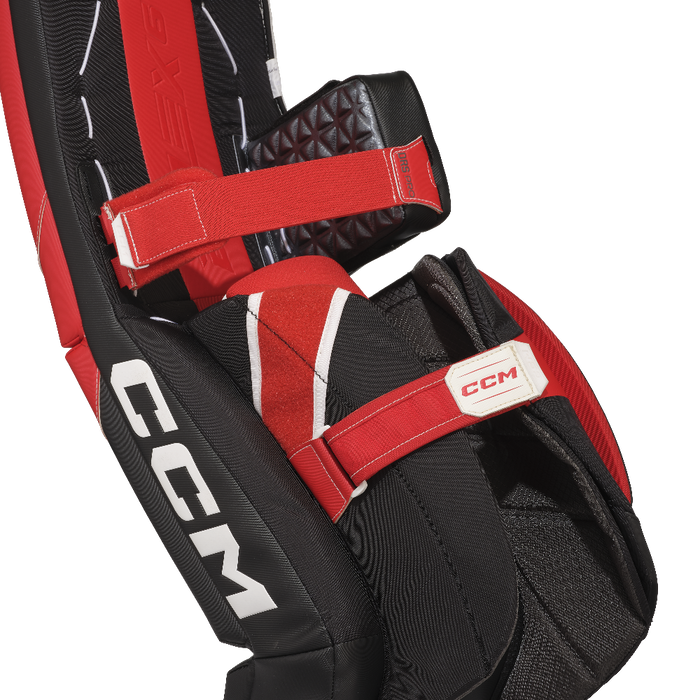 black and red goalie pads