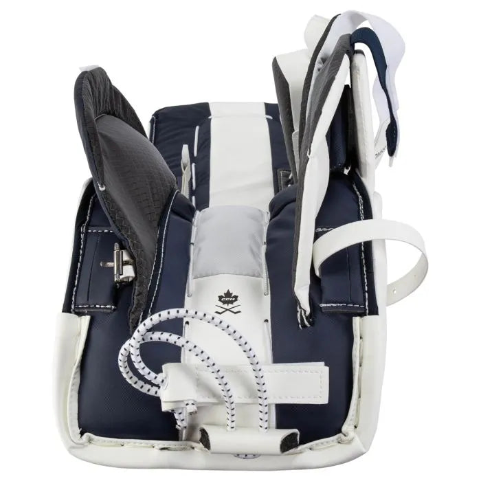 white goalie pads with navy details and lining