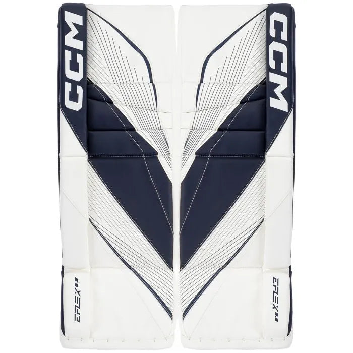 white goalie pads with navy details
