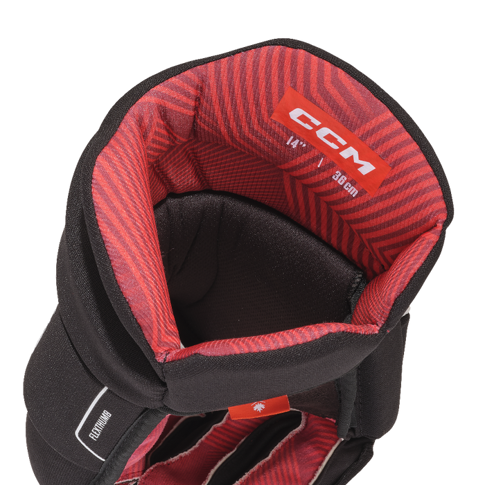 black hockey glove with red lining