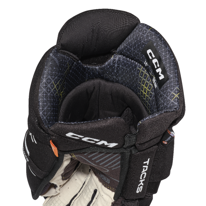 black ccm glove with white accents and black lining