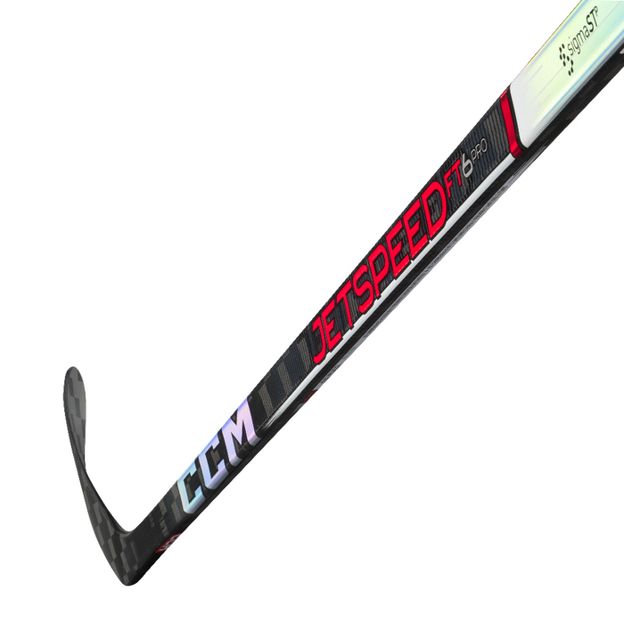 Black stick with red writing and white handle