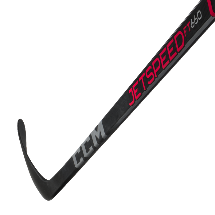 Black hockey stick with red and silver accents