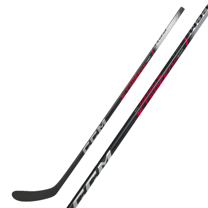 Black hockey stick with red and silver accents