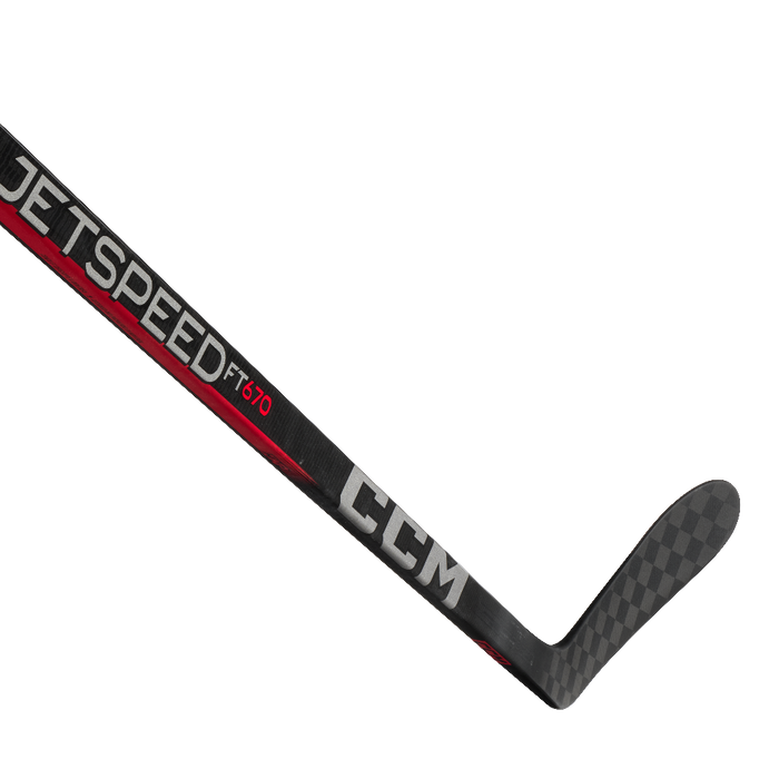 Black hockey stick with silver writing and red details