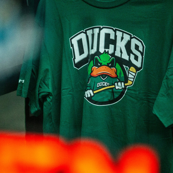 green shirt with ducks logo