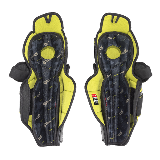 black shin pads with yellow lining