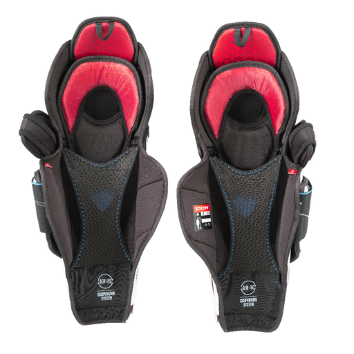 Black shin guards with black and red lining