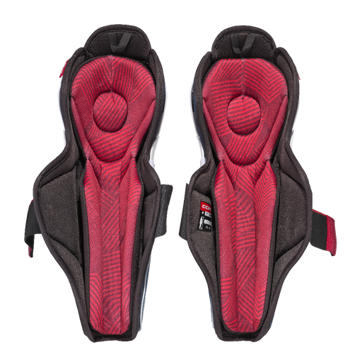 White shin guards with blue details and red padding