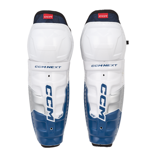 white shin guards with blue details
