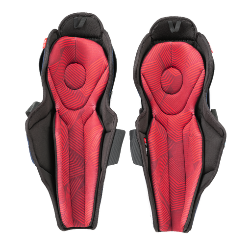 Black shin guards with white and blue details. with red padding