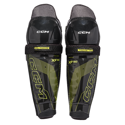 black and yellow shin guards