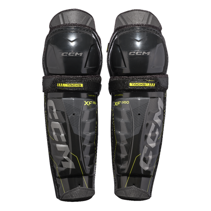 Black shin pads with yellow accents