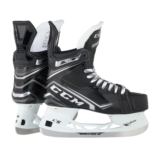 Black skates, with small green features. White laces and black lining