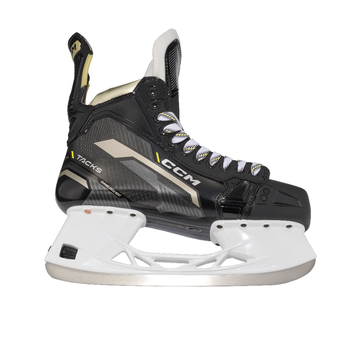 Black skates with gold accents, white laces and black lining