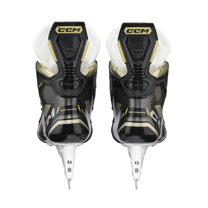 Black skates with gold accents, white laces and black lining