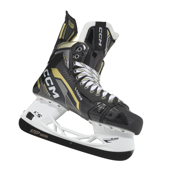 Black skates with gold accents, white laces and black lining