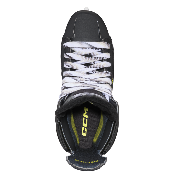 Black skates with gold accents, white laces and black lining