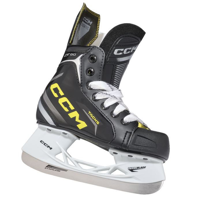 One black skate, with yellow CCM