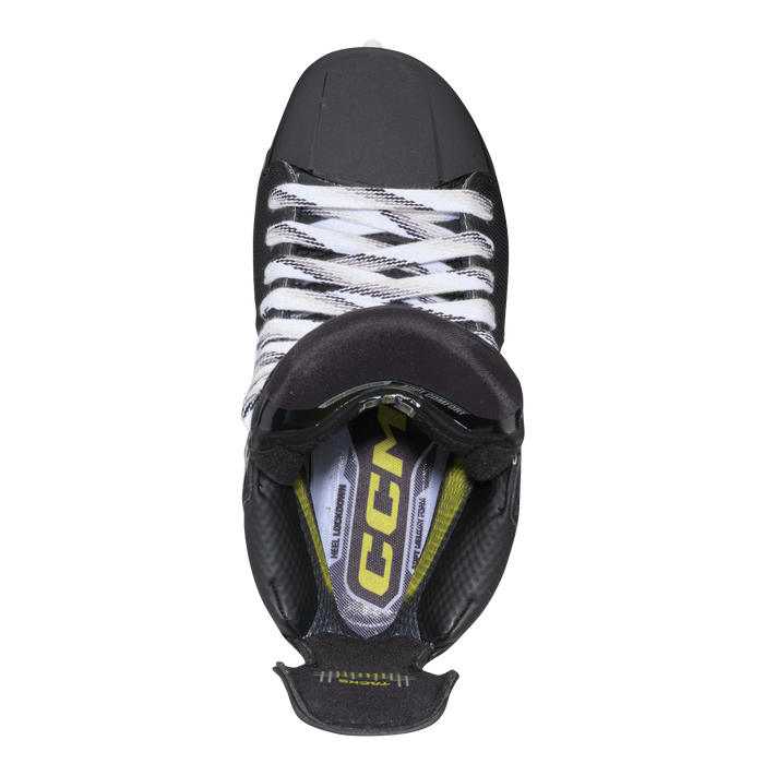 Black skates with gold accents, white laces and black lining