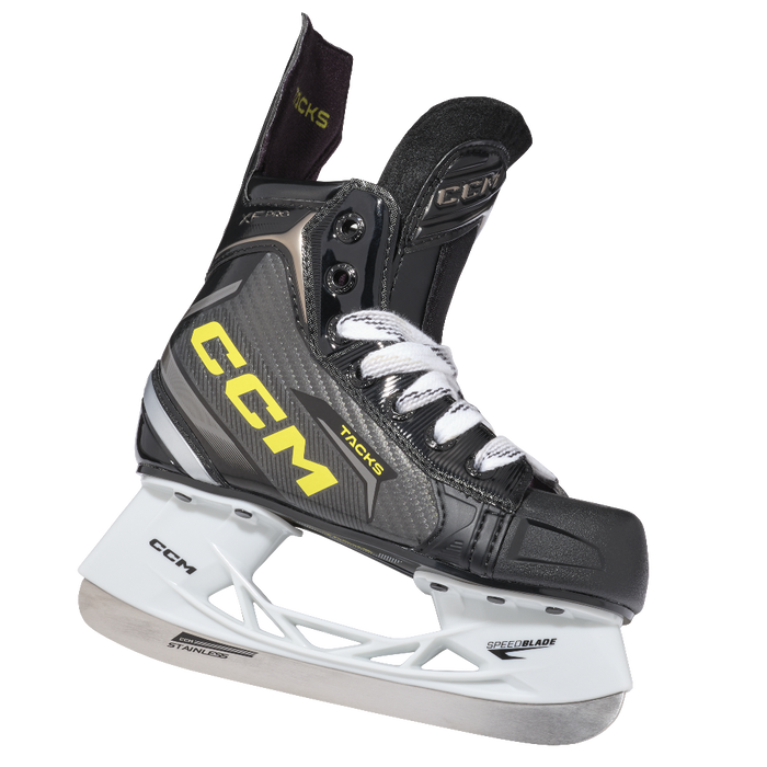 One black skate, with yellow CCM