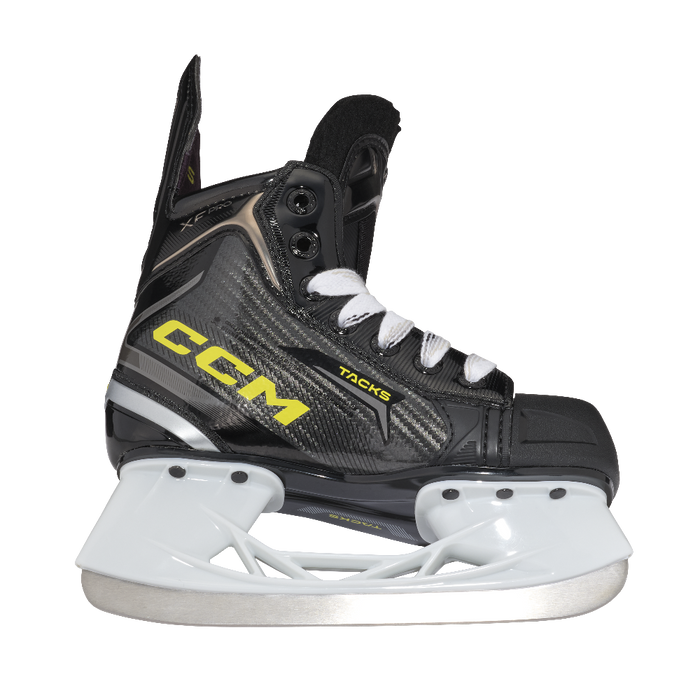 One black skate, with yellow CCM