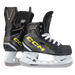 Two black skates, with yellow CCM