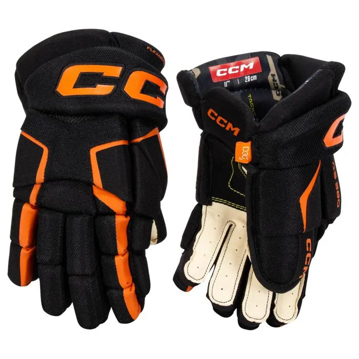 Black gloves with orange detail and off-white lining