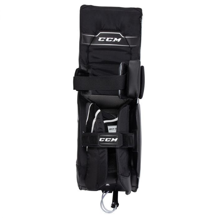 Black goalie leg pads with white text