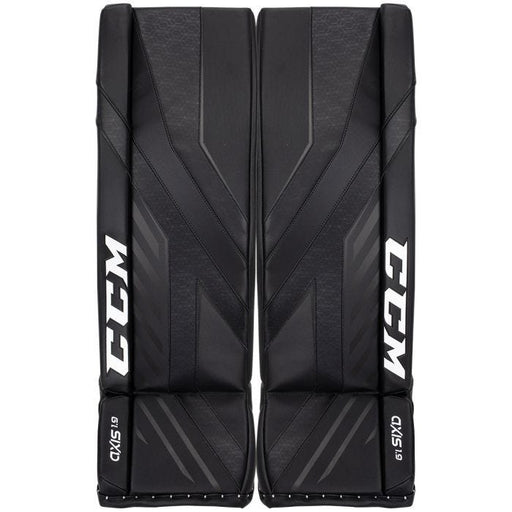 Black goalie leg pads with white text