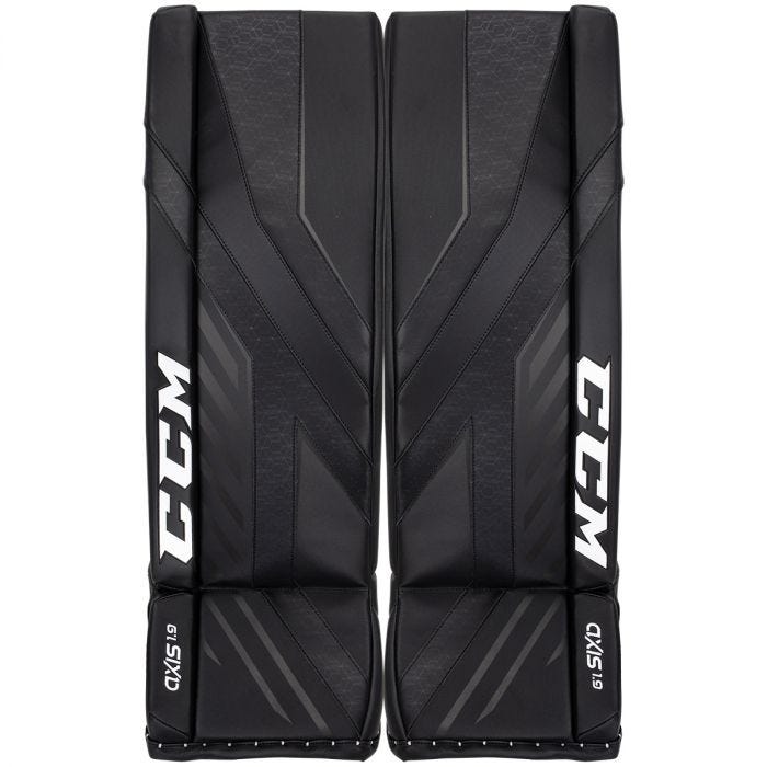 Black goalie leg pads with white text