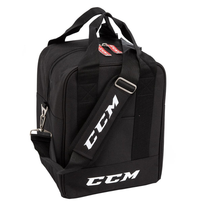 Black puck bag with white ccm logo