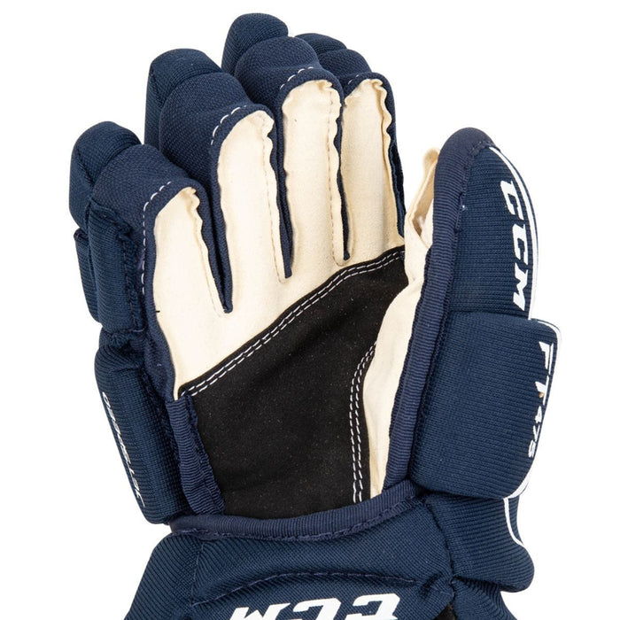 Blue gloves with white detail and off white palm