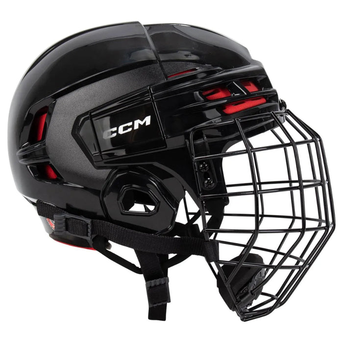 black helmet with red padding and black cage