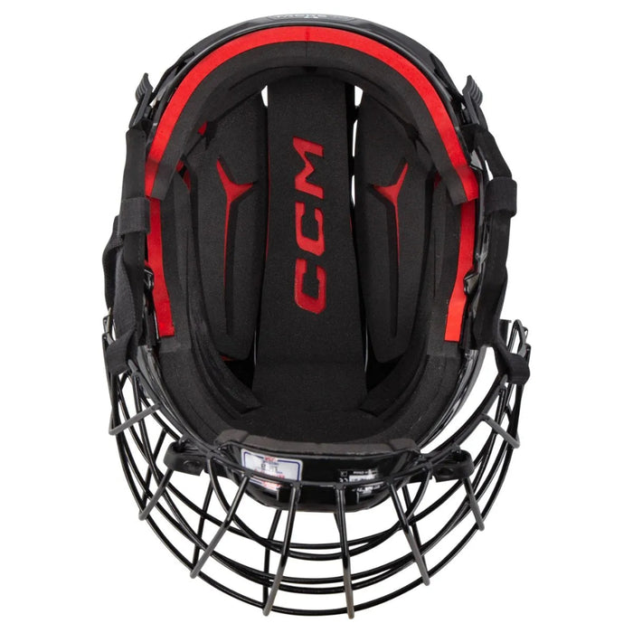 black helmet with red padding and black cage