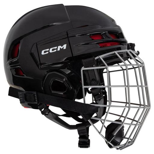 black helmet with red padding and silver cage