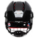 black helmet with red padding and silver cage