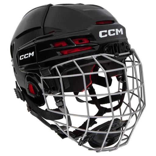 black helmet with red padding and silver cage