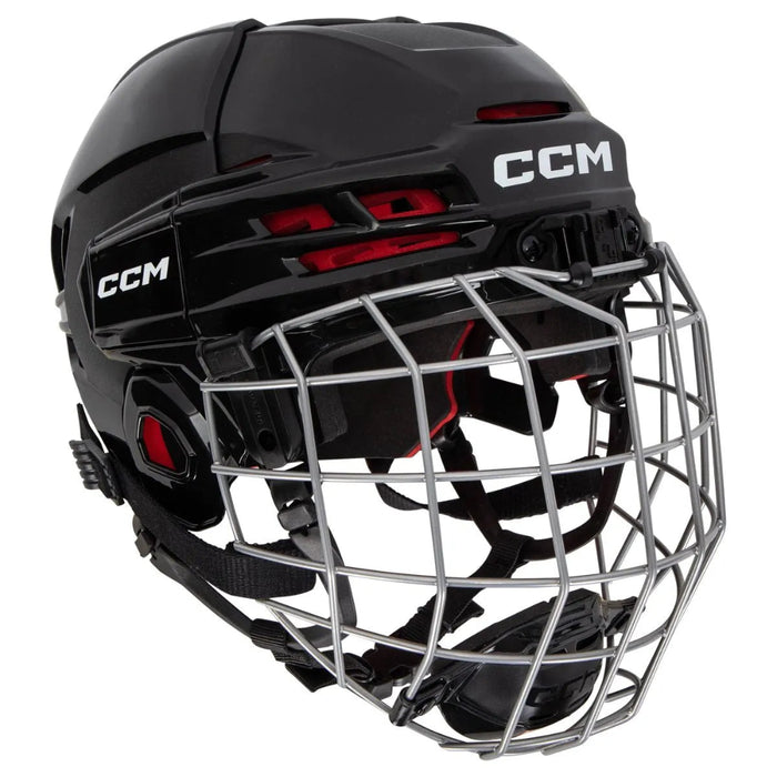black helmet with red padding and silver cage