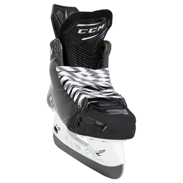 Black skates, with small green features. White laces and black lining