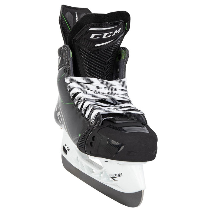 Black skates, with small green features. White laces and black lining