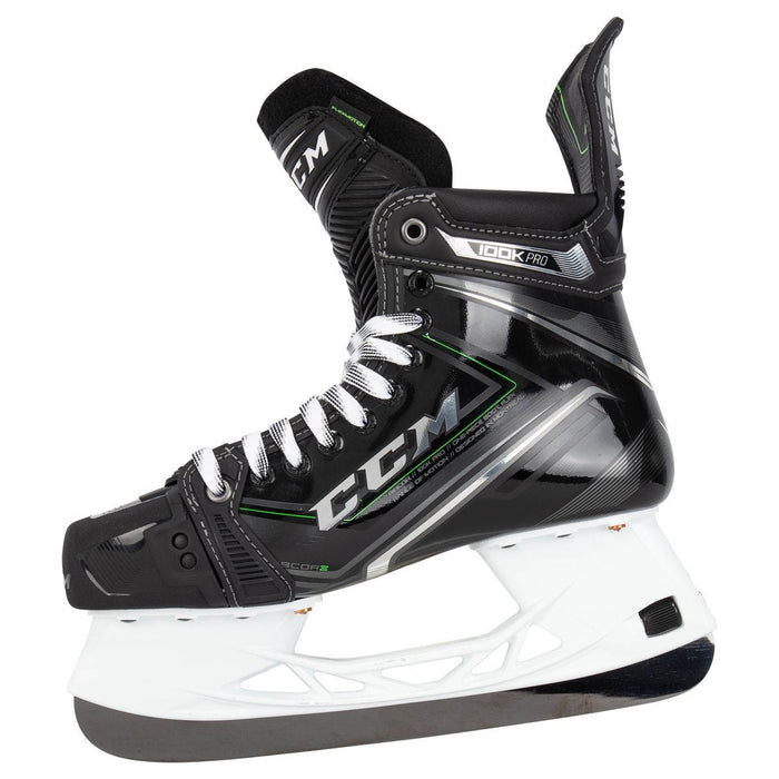 Black skates, with small green features. White laces and black lining