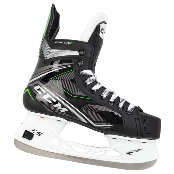 Black skates with green features. White laces. 