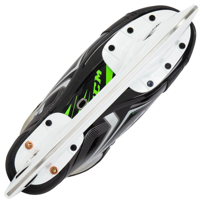 Black skates with green features. White laces. 