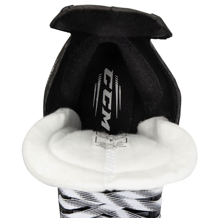 Black skates with green features. White laces. 