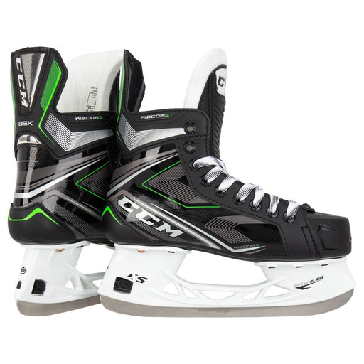 Black skates with green features. White laces. 