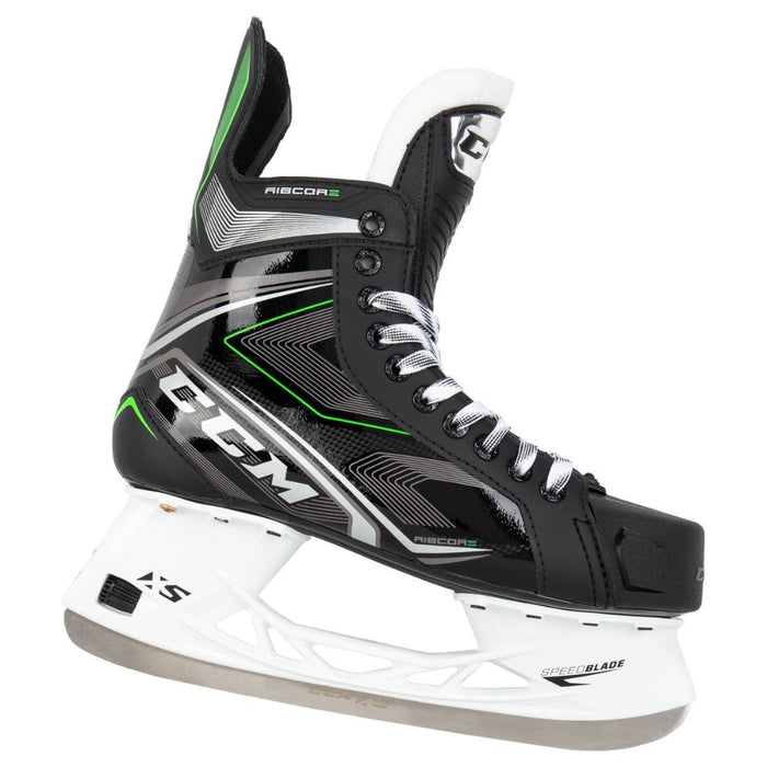 Black skates with green features. White laces. 